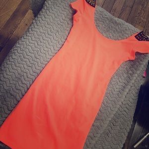 Peach mini dress with spike shoulder embellishment